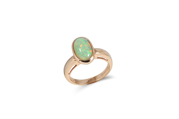 Twist Opal Ring set in Yellow Gold